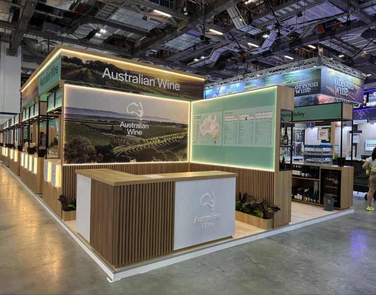 Australian Wine exhibition stand with illuminated vineyard graphics, timber counters and bottle displays.